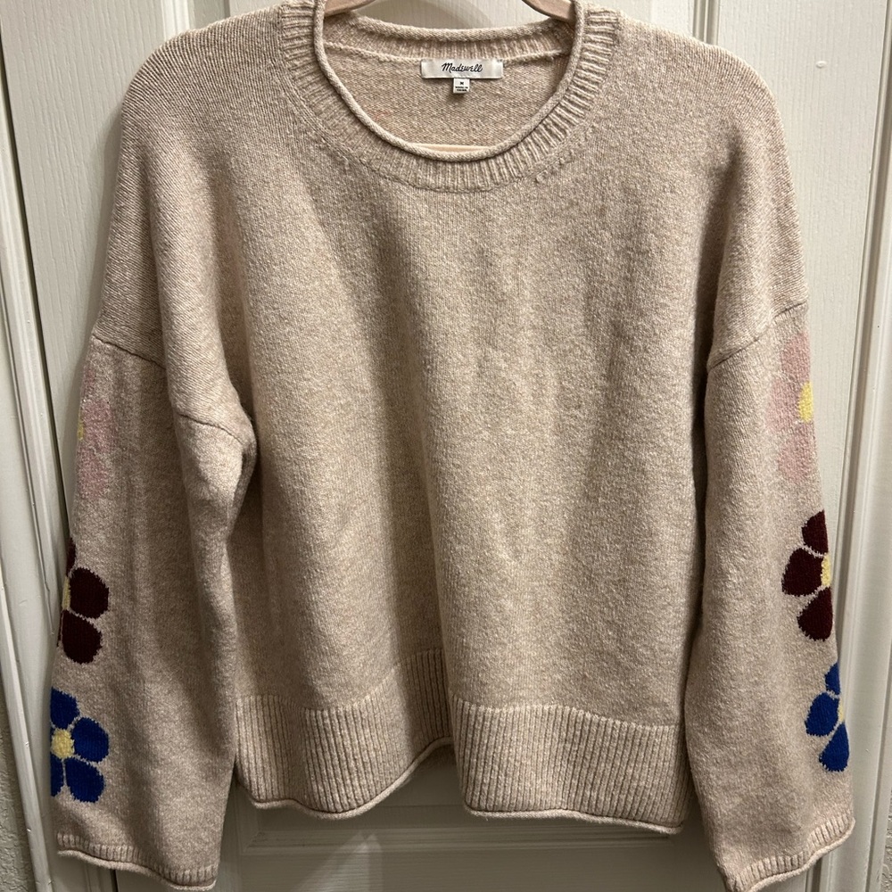 Madewell sweater with flower detail on arms